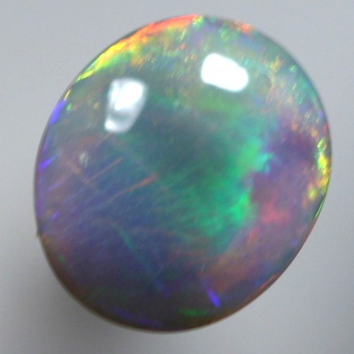 SOLID SEMI BLACK OPAL Blend of orange and green, red and blue